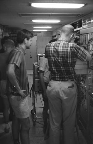 CVN 09 Working Inside The Operations Van, Engineer Don Kennedy On The Left Nov 1966